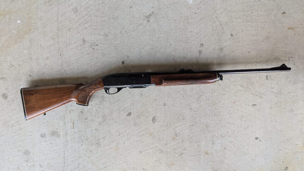 Remington 7400 semi-auto hunting rifle with wood stock